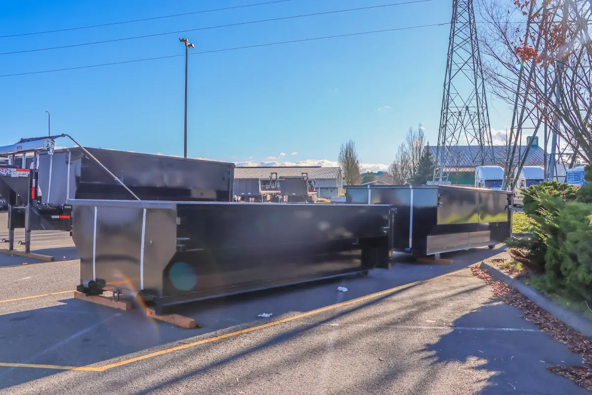 Roll-off dumpster ready for waste disposal at job site for Concrete Dumpster Rental in Jeannette